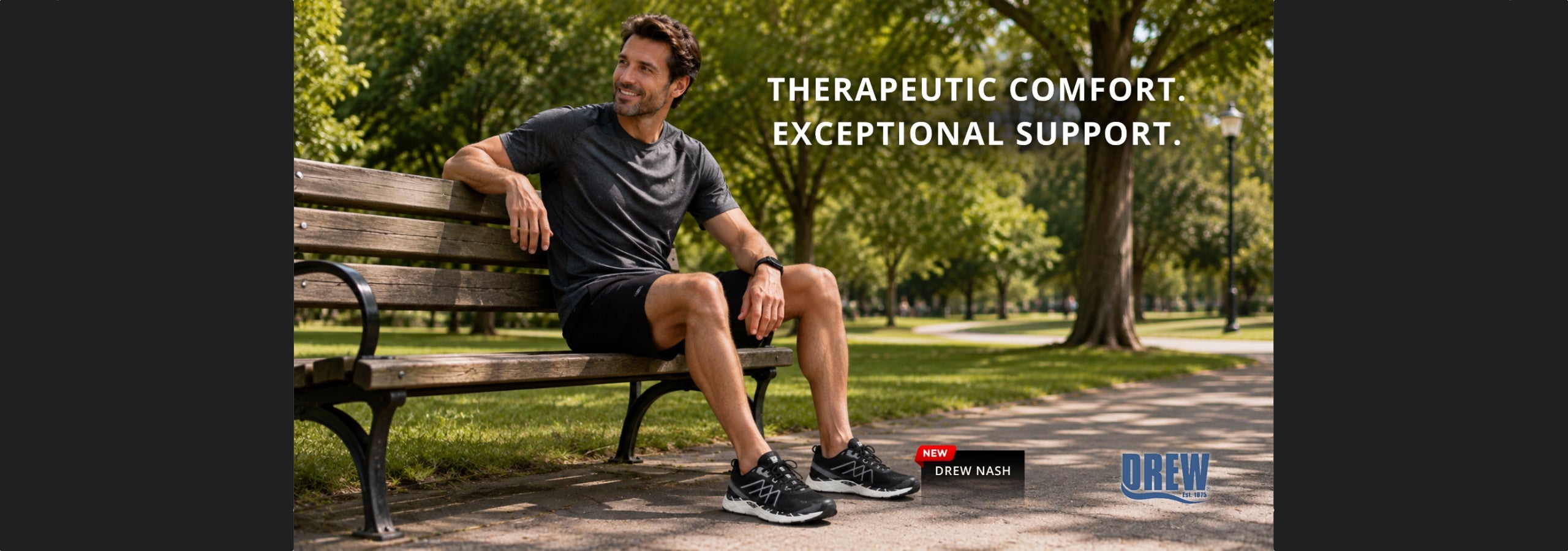 A man sits on a park bench wearing a dark gray t-shirt and black shorts, with outdoor trees in the background. White text on the right reads 'THERAPEUTIC COMFORT EXCEPTIONAL SUPPORT.
